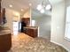 Kitchen featuring dark cabinets, appliances, and tiled floor at 7629 High Maple Cir, North Charleston, SC 29418
