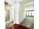 Open-concept living room with large windows for natural light and wood floors at 7629 High Maple Cir, North Charleston, SC 29418