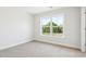 Bright bedroom with a large window offering natural light and scenic views at 770 Opal Wing St, Moncks Corner, SC 29461