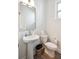 Charming half bath features a pedestal sink, modern fixtures, and a sleek toilet at 770 Opal Wing St, Moncks Corner, SC 29461