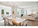 Bright open-concept living space perfect for entertaining, connecting dining room and seating area at 770 Opal Wing St, Moncks Corner, SC 29461