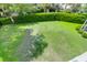 A spacious backyard shows an expansive green lawn with manicured shrubs at 779 Forrest Dr, Charleston, SC 29492