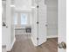 Bedroom with hardwood floors, walk-in closet and attached bathroom at 779 Forrest Dr, Charleston, SC 29492