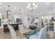 Open-concept dining area and kitchen with lots of natural light and elegant decor at 779 Forrest Dr, Charleston, SC 29492