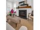 Close-up of the fireplace with a wood mantel and decorative accents at 779 Forrest Dr, Charleston, SC 29492