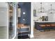 Modern kitchen with stainless steel appliances, stylish lighting, and center island with seating at 779 Forrest Dr, Charleston, SC 29492