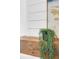 Close-up of the wood mantel with a decorative plant at 779 Forrest Dr, Charleston, SC 29492