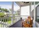Charming screened-in porch perfect for relaxing and enjoying the outdoor scenery at 779 Forrest Dr, Charleston, SC 29492