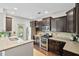 Well-equipped kitchen with granite countertops, stainless steel appliances, and ample cabinet space at 826 Bibury Ct, Charleston, SC 29414