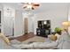 Cozy living room with comfortable seating, hardwood floors, and plenty of natural light at 826 Bibury Ct, Charleston, SC 29414