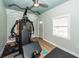This exercise room features vinyl flooring and a full home gym setup at 8562 N Highway 17, McClellanville, SC 29458