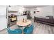 Open-concept space with modern kitchen, dining area, and comfortable living room seating at 8562 N Highway 17, McClellanville, SC 29458