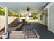 Covered outdoor patio furnished with comfortable seating, creating a relaxing and inviting space at 8562 N Highway 17, McClellanville, SC 29458