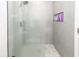 Modern shower with rainfall showerhead, niche, and decorative tile at 8562 N Highway 17, McClellanville, SC 29458