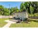 Backyard storage shed with a small deck, perfect for storage or hobbies at 8562 N Highway 17, McClellanville, SC 29458