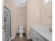 Bathroom with a glass-enclosed shower and a vanity with modern fixtures and design at 8743 Grassy Oak Trl, North Charleston, SC 29420