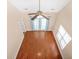 Bright bedroom with hardwood floors, French doors, ceiling fan, and natural light at 8743 Grassy Oak Trl, North Charleston, SC 29420
