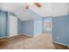 Bedroom featuring neutral carpet, ceiling fan and freshly painted walls at 8743 Grassy Oak Trl, North Charleston, SC 29420