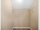 Walk-in closet with built in shelving and carpeted flooring at 8743 Grassy Oak Trl, North Charleston, SC 29420