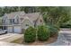 Attractive townhome with a well-manicured lawn, offering a welcoming and picturesque curb appeal at 8743 Grassy Oak Trl, North Charleston, SC 29420