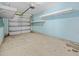 Attached garage with overhead storage and a garage door opener for convenient parking and storage at 8743 Grassy Oak Trl, North Charleston, SC 29420