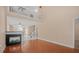 Open-concept living space showcasing a fireplace and staircase leading to the second level at 8743 Grassy Oak Trl, North Charleston, SC 29420