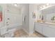 Clean bathroom featuring a shower-tub combo, modern vanity, and tile flooring at 1012 Basildon Rd, Mount Pleasant, SC 29466