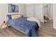 Bright bedroom with hardwood floors, neutral décor and a comfortable bed at 1012 Basildon Rd, Mount Pleasant, SC 29466