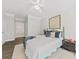 Cozy bedroom with hardwood floors and neutral décor including a flower painting above the bed at 1012 Basildon Rd, Mount Pleasant, SC 29466