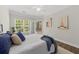 Bright and airy bedroom with a door leading to a screened-in patio area at 1012 Basildon Rd, Mount Pleasant, SC 29466