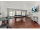 The game room features a pool table and a TV with tables and stools at 1012 Basildon Rd, Mount Pleasant, SC 29466