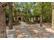 The gazebo is a scenic brick pathway and is surrounded by mature trees and lush landscaping at 1012 Basildon Rd, Mount Pleasant, SC 29466