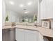 Bright kitchen area with sink, and modern appliances, offering a view into the living area at 1012 Basildon Rd, Mount Pleasant, SC 29466
