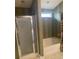 Contemporary bathroom featuring a separate glass-enclosed shower and soaking tub, designed for comfort and convenience at 103 Savannah River Dr, Summerville, SC 29485