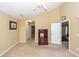 Cozy bedroom featuring neutral carpeting, a ceiling fan, and a view into the hallway at 103 Savannah River Dr, Summerville, SC 29485