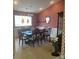 Elegant dining room features a large table, ornate chairs, and stylish decor for formal gatherings at 103 Savannah River Dr, Summerville, SC 29485