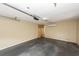 Large garage with exposed ceiling hardware; ready to be used for storage or parking at 103 Savannah River Dr, Summerville, SC 29485