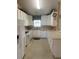 Efficient kitchen features white cabinetry, ample counter space, and modern appliances for easy meal preparation at 103 Savannah River Dr, Summerville, SC 29485