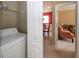 Laundry area with washer and dryer, as well as access to dining room and sitting room at 103 Savannah River Dr, Summerville, SC 29485