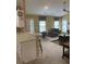 Open-concept living room showcases a fireplace, seating area, and seamless flow for easy living and entertaining at 103 Savannah River Dr, Summerville, SC 29485