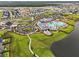 Stunning aerial view of community amenities including a resort-style pool, clubhouse, and beautiful landscaping at 109 Medford St, Summerville, SC 29486