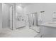Spacious primary bathroom featuring dual vanities, full-length mirror, and modern fixtures at 109 Medford St, Summerville, SC 29486