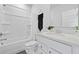 Clean bathroom featuring a combined shower and tub, with a vanity and quartz countertop at 109 Medford St, Summerville, SC 29486