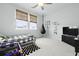 Stylish bedroom with a hanging seat, window with bamboo shade, and modern decor at 109 Medford St, Summerville, SC 29486