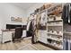 Well-organized walk-in closet with custom shelves and a dedicated desk area for working from home at 109 Medford St, Summerville, SC 29486