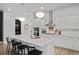 Stylish kitchen featuring a large island with seating, quartz countertops, and stainless steel appliances at 109 Medford St, Summerville, SC 29486