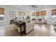 Bright living room with ample seating, woven window shades, and stylish decor at 109 Medford St, Summerville, SC 29486