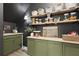 Charming pantry featuring open shelving, green cabinetry, and a well-organized storage system at 109 Medford St, Summerville, SC 29486