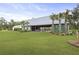 Recreation center with covered outdoor seating, palm trees, and lush green lawn at 109 Medford St, Summerville, SC 29486