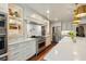 Gourmet kitchen with a large island, stainless steel appliances, and custom cabinets at 1106 Meadowcroft Ln, Mount Pleasant, SC 29464